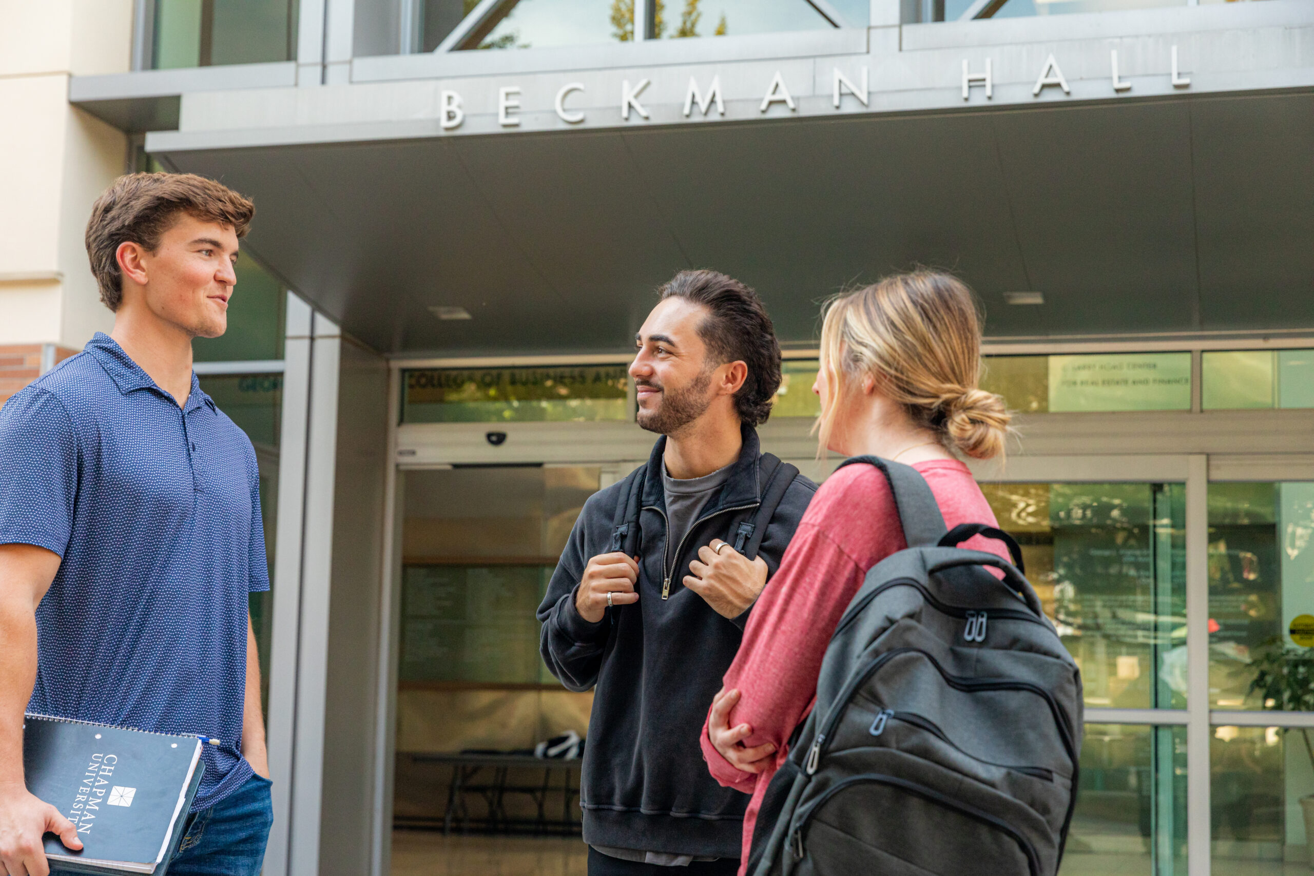 Chapman students in front of Beckman Hall